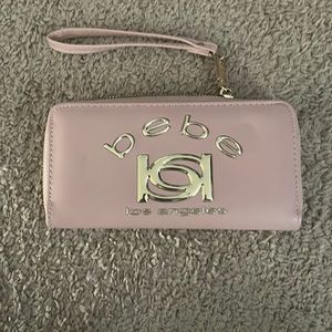 Bebe LA mauve wristlet wallet.
